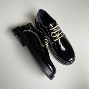 Mason Margiela MM6 patent leather black derby’s.